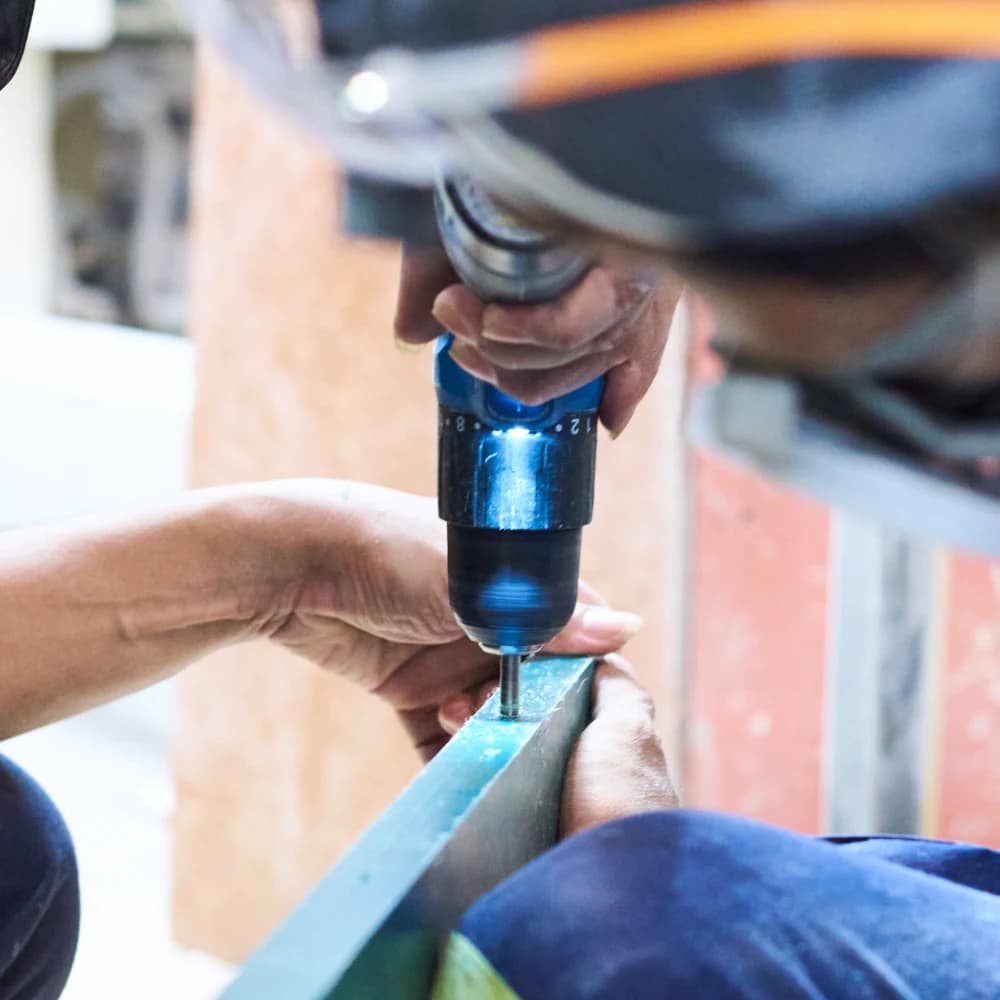 Installing a screw in Robries Polymer Sheet with a drill